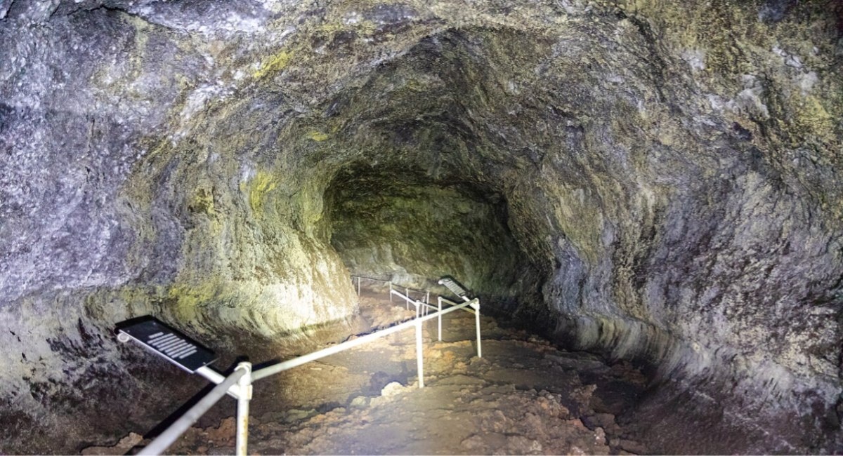 Hāna Lava Tube walkway leading into an ancient volcanic cave