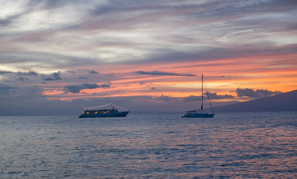 Going on a romantic sunset dinner cruise is a must-do on your Maui honeymoon itinerary