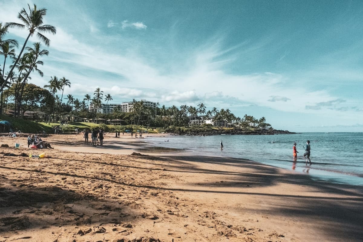 People walking over the Haleakalā Crater along Wailea Beach which is free to visit and an affordable day out on Maui